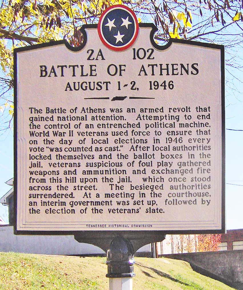 Tennessee Historical Commission marker in Athens, Tennessee, describing the 1946 Battle of Athens, photographed from the hill where the veterans took up position overlooking the old jail