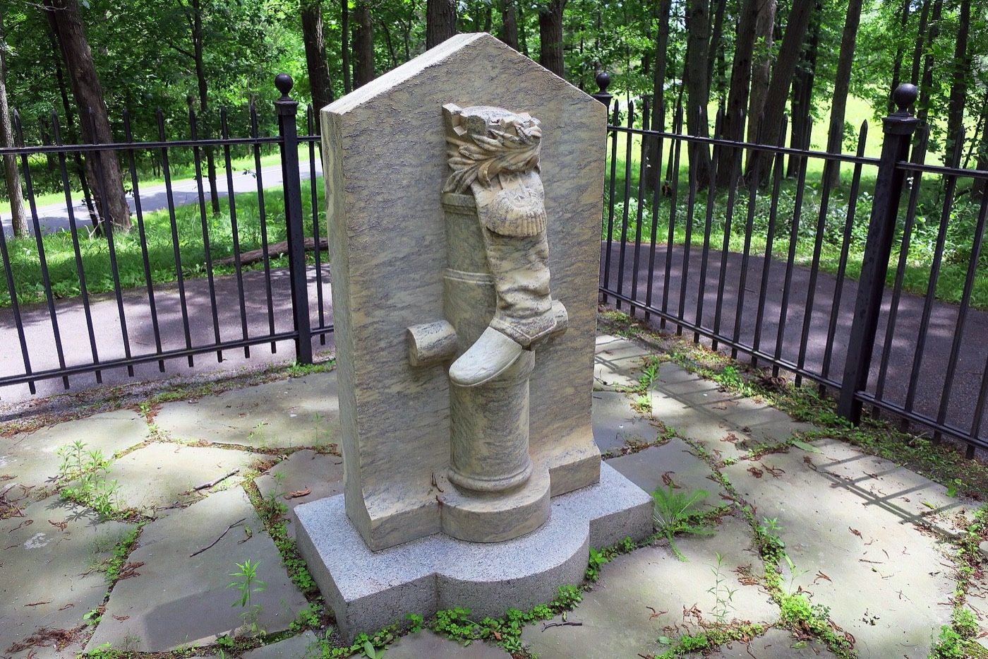 The Boot Monument at Saratoga National Historical Park, a stone marker carved with a military boot and a cannon barrel, honouring the leg Benedict Arnold was shot in without naming him