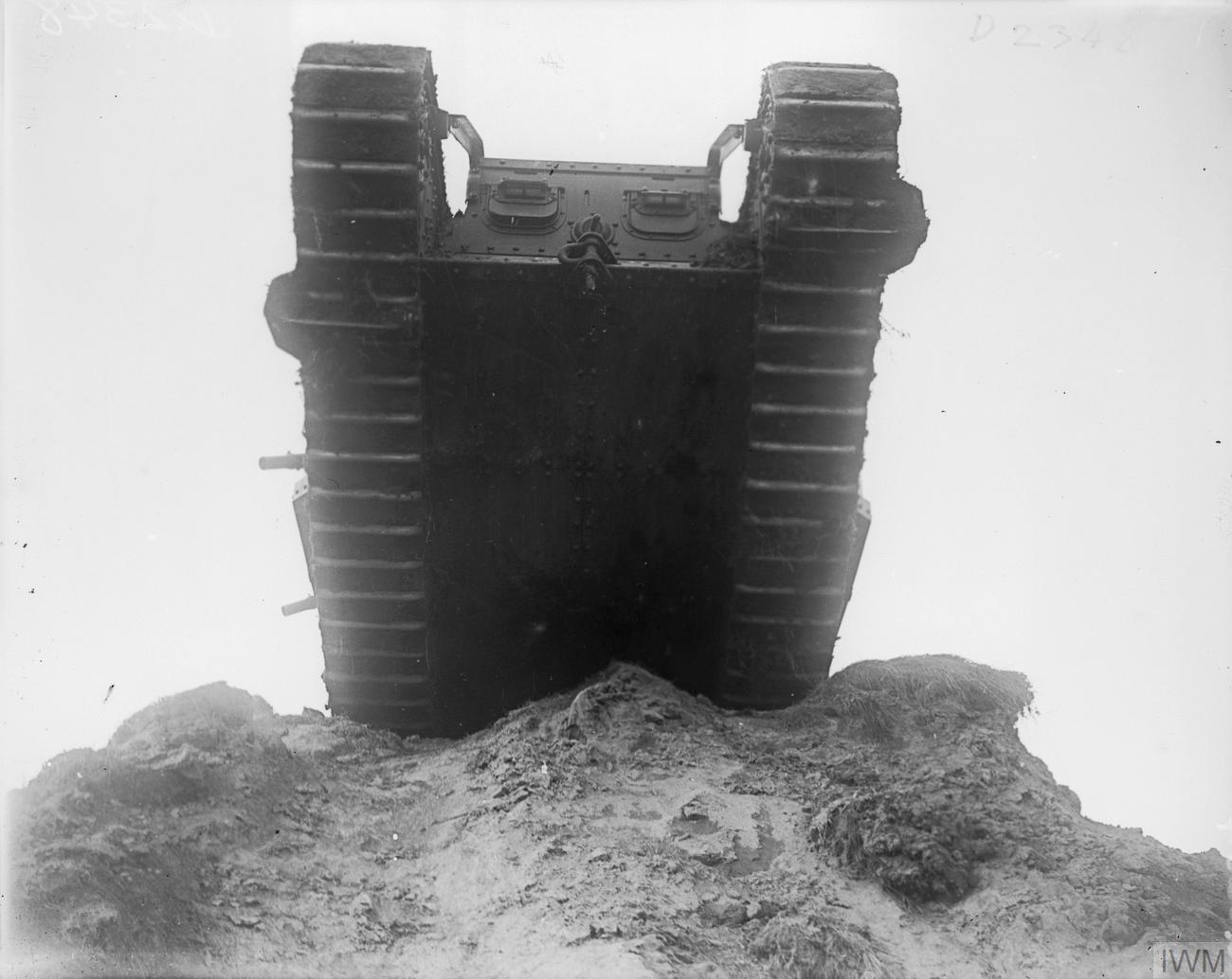 A British Mark IV tank photographed from ground level at Wailly in October 1917, staged to show how a tank appeared to troops in a trench