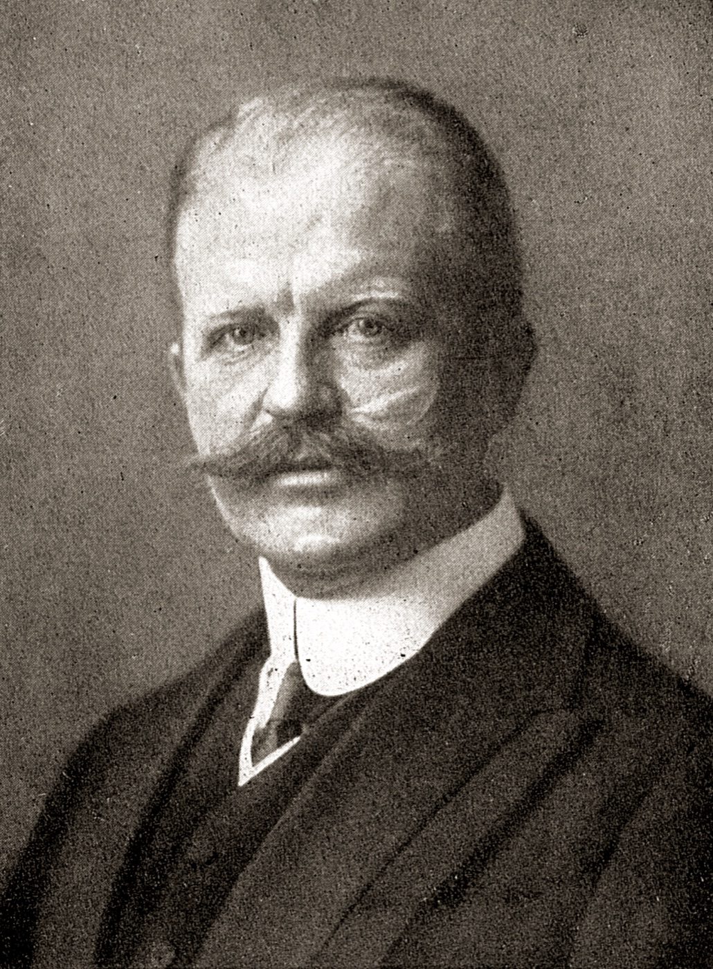 Portrait photograph of Arthur Zimmermann, German Foreign Secretary, wearing a wing collar and dark jacket